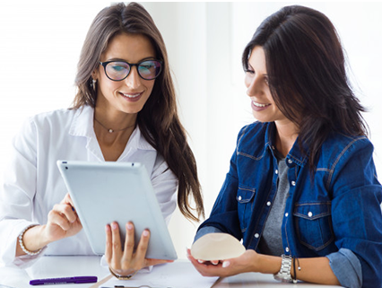 Two business professionals working with tablet